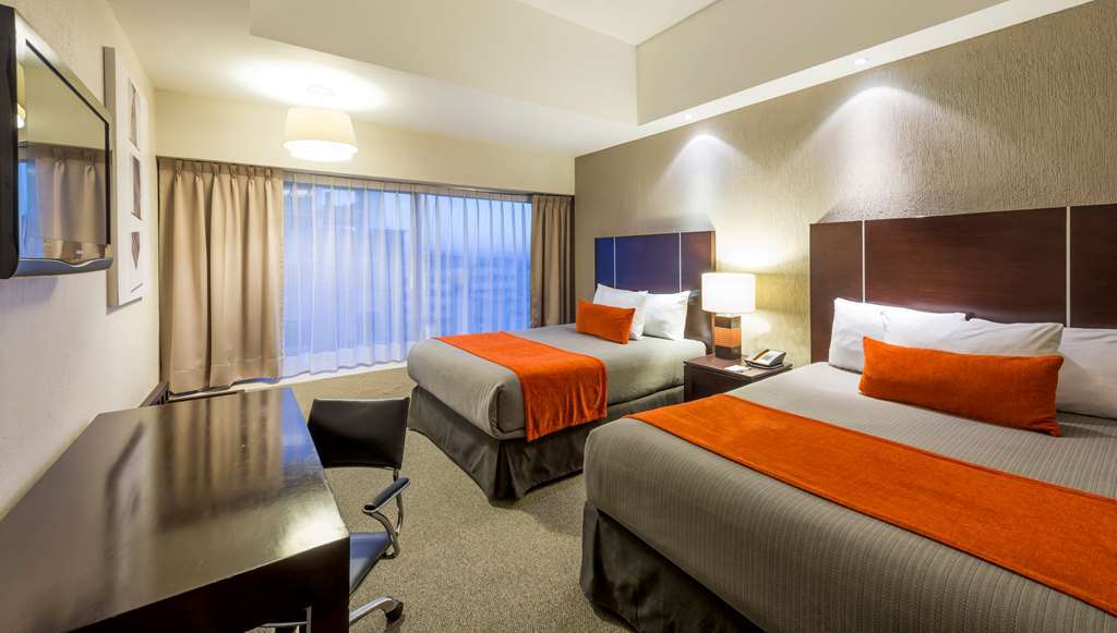 Hotel Plaza Genova Centro Гуадалахара Стая снимка